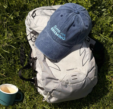 A Sorry I'm Brewing Hat by RAVE COFFEE, made of soft brushed cotton and embroidered with 