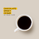 A white coffee cup of black Indian Monsoon Malabar Coffee Nº 53 sits on a light beige background. Beside it, text—Chocolate Smoky Cedar as a black filter—appears with each word highlighted in yellow.