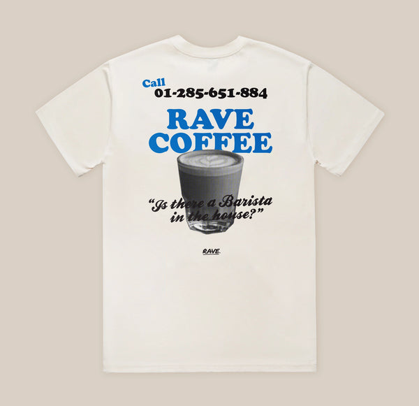 A white t-shirt with a graphic print on the back, in blue and black, a coffee cup illustration, and the quote 'Is there a Barista in the house?'.
