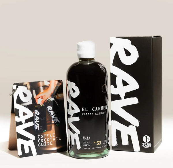 A bottle of RAVE COFFEE Coffee Liqueur sits beside its black box with bold white RAVE branding, accompanied by a branded cocktail guide featuring a photo.
