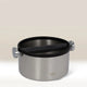 The MOTTA Knock Box 165mm features a sturdy stainless steel build with a black rubber bar for easy grounds disposal. The MOTTA logo appears on the front, set against a gradient beige background.