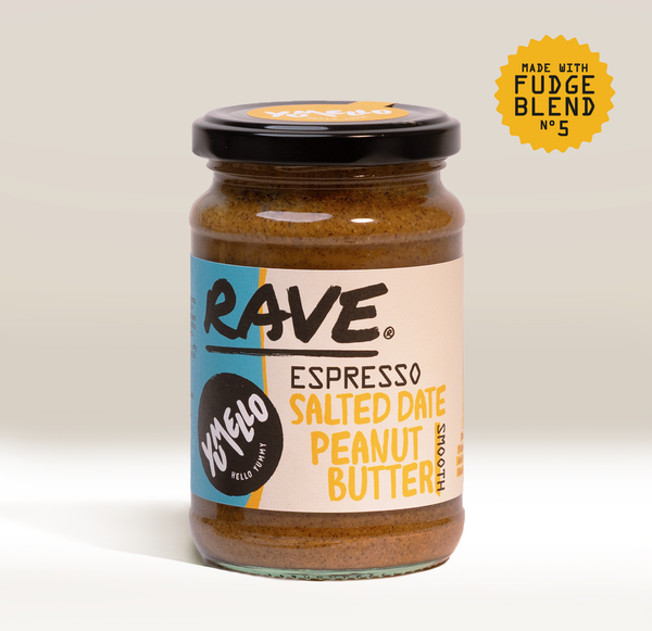 A jar labeled Espresso Salted Date Peanut Butter by RAVE Coffee, featuring a yellow badge that says Made with Fudge Blend No. 5 on a light background—an indulgent espresso peanut butter that’s vegan and palm-oil free.