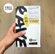A hand holds a bag of RAVE COFFEE's Nº 27 Pistonheads Blend limited-edition coffee, featuring bold black lettering, a yellow Stay Fueled keychain, and a label offering a free sticker. Text highlights that 1% of sales support the planet.