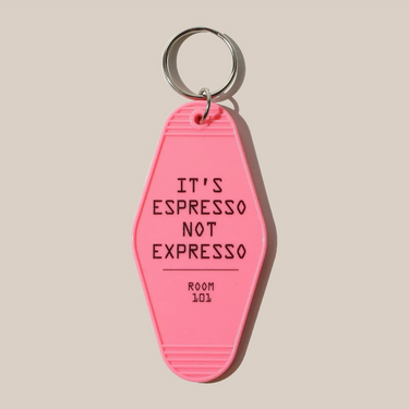 The Rave Keyring by RAVE Coffee features a pink vintage motel design with 