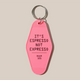 The Rave Keyring by RAVE Coffee features a pink vintage motel design with 