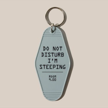The RAVE Coffee Rave Keyring is a pale blue motel-style keyring with black 