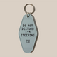 The RAVE Coffee Rave Keyring is a pale blue motel-style keyring with black 