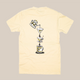 The Rave V60 T-Shirt by RAVE COFFEE is a cream unisex cotton tee with a back print of a coffee pot pouring into two filters and a cup, forming the word 