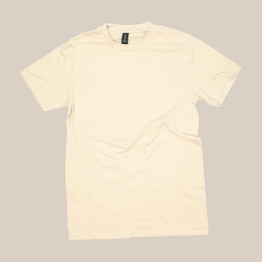 The Rave V60 | T-Shirt by RAVE COFFEE is a beige unisex tee made from sustainable cotton and laid flat on a neutral background. It features a black collar tag with no visible designs or logos, offering a clean, minimalist look.