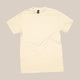 The Rave V60 | T-Shirt by RAVE COFFEE is a beige unisex tee made from sustainable cotton and laid flat on a neutral background. It features a black collar tag with no visible designs or logos, offering a clean, minimalist look.