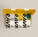 Three Ravecoffee bags from the Best Selling Coffee Bundle Gift Pack, each filled with premium medium/dark roast beans, are neatly arranged in an open yellow gift box. Each bag displays a bold black 