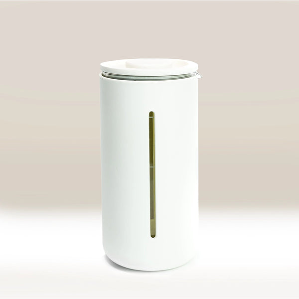 A white cylindrical Timemore French Press U with a lid and a vertical transparent window on the front, partially revealing the contents inside. Set against a plain, neutral background.