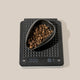 Digital kitchen scale with a bowl of coffee beans on a beige background