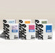 Four boxes of Ravecoffee’s Best Selling Single Origins - Whole Bean Variety Pack, each featuring vibrant blue, purple, green, and yellow labels with “RAVE” printed vertically, are arranged side by side on a light background—ideal for coffee lovers looking to explore unique flavors from around the world.