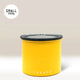 The Planetary Design Yellow Airscape Coffee Storage Container with oxygen removal tech and a black lid sits on a neutral background. A white starburst in the top left corner reads 